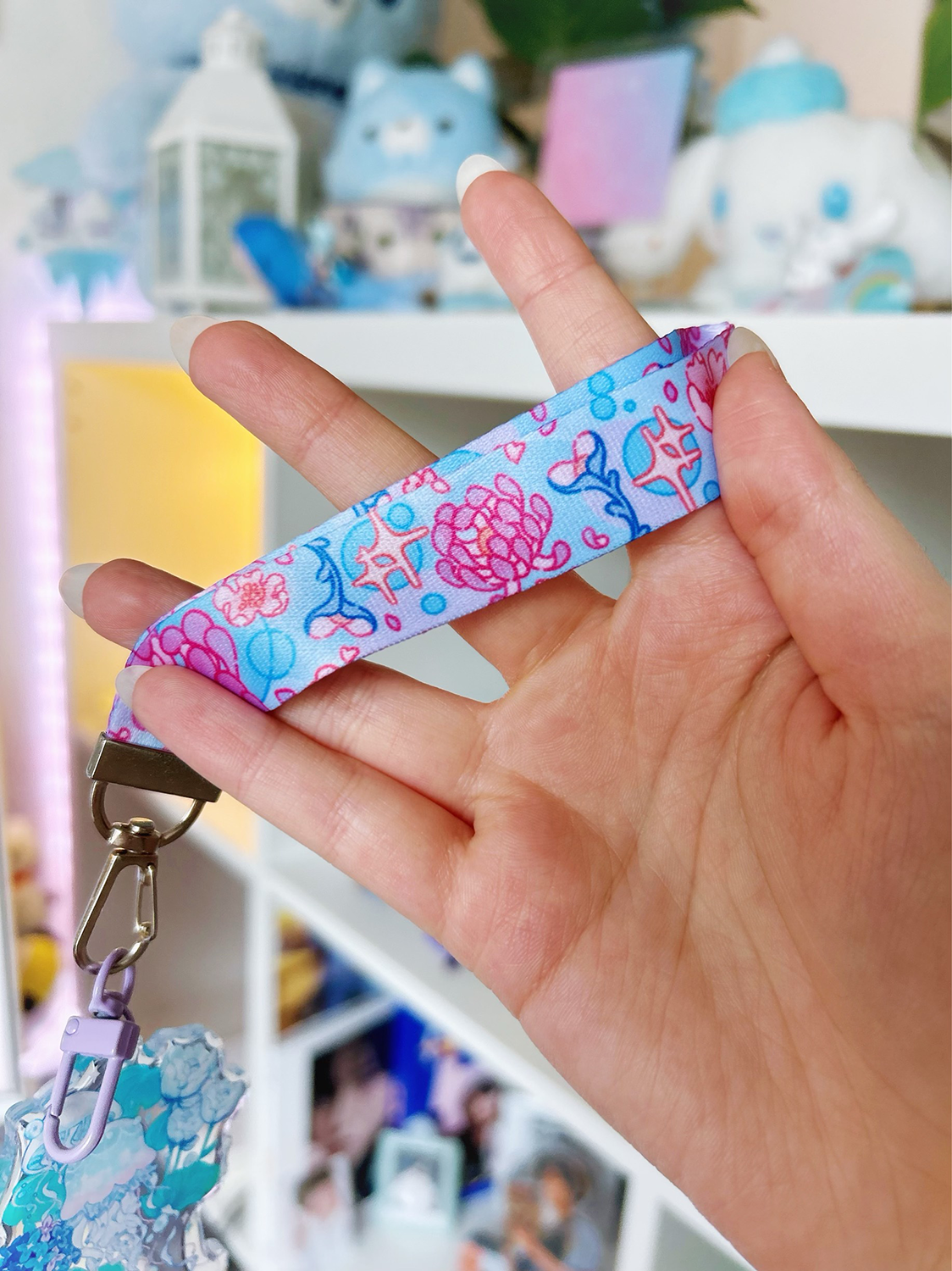 An acrylic lanyard keychain featuring a Jellyfish Garden concept
