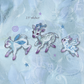 Three small fantasy animal stickers on a pale blue textured background with stars and the text '2.5" sticker'.