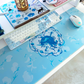 Decorative heart-shaped cupid swan themed mousepad desk mat for cute gaming set-ups and coquette blue and white theme.
