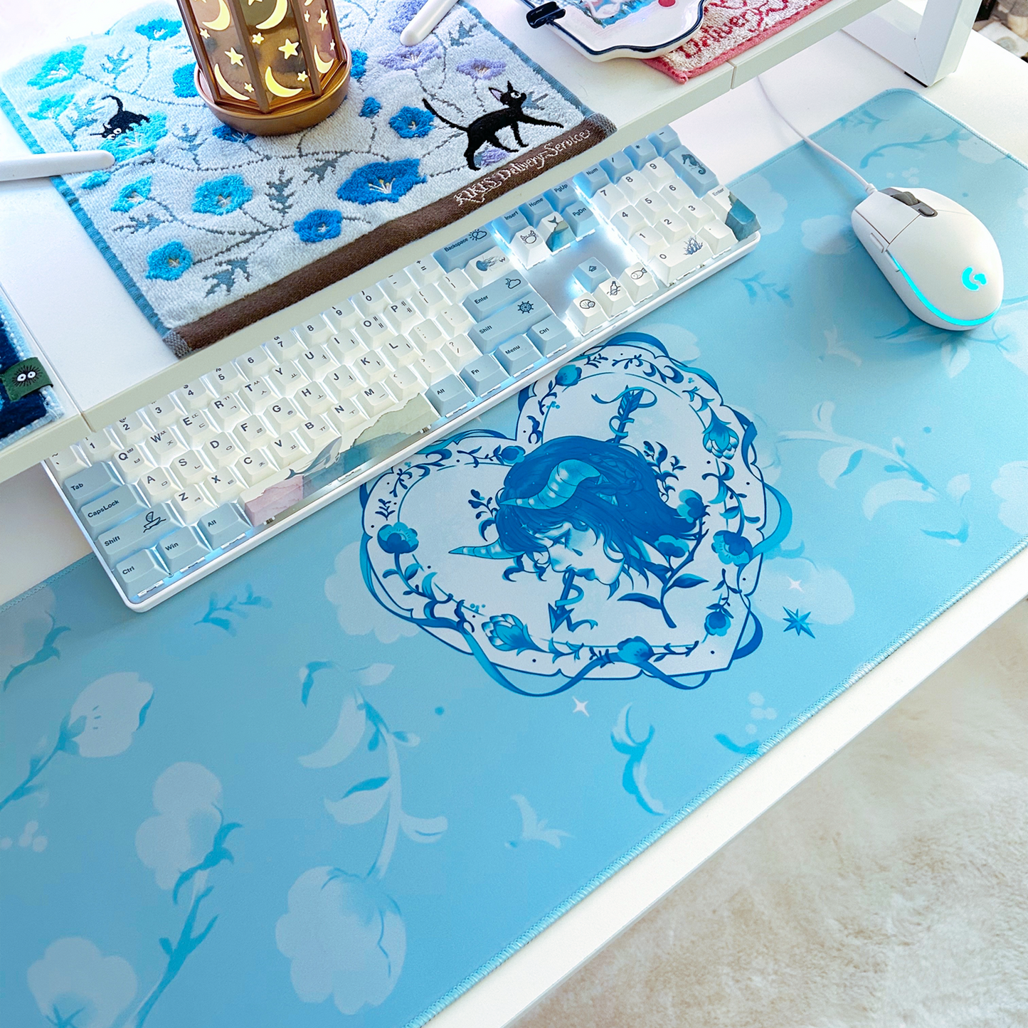 Decorative heart-shaped cupid swan themed mousepad desk mat for cute gaming set-ups and coquette blue and white theme.