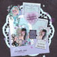 Collection of artistic sea milk snail mail club products including a postcard, sticker, ticket photocard, and love letter on a brown background.
